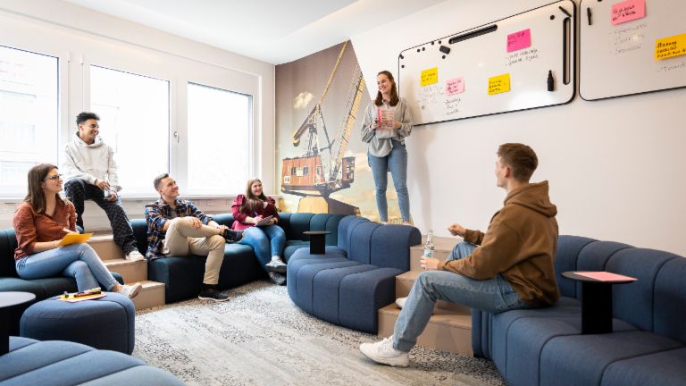 Group of young EOS trainees in workshop